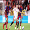 A painful blow: Barcelona star leaves the Sevilla match in tears | Goal.com